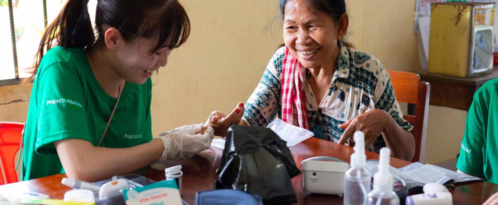 Medical intern during community outreach in Cambodia